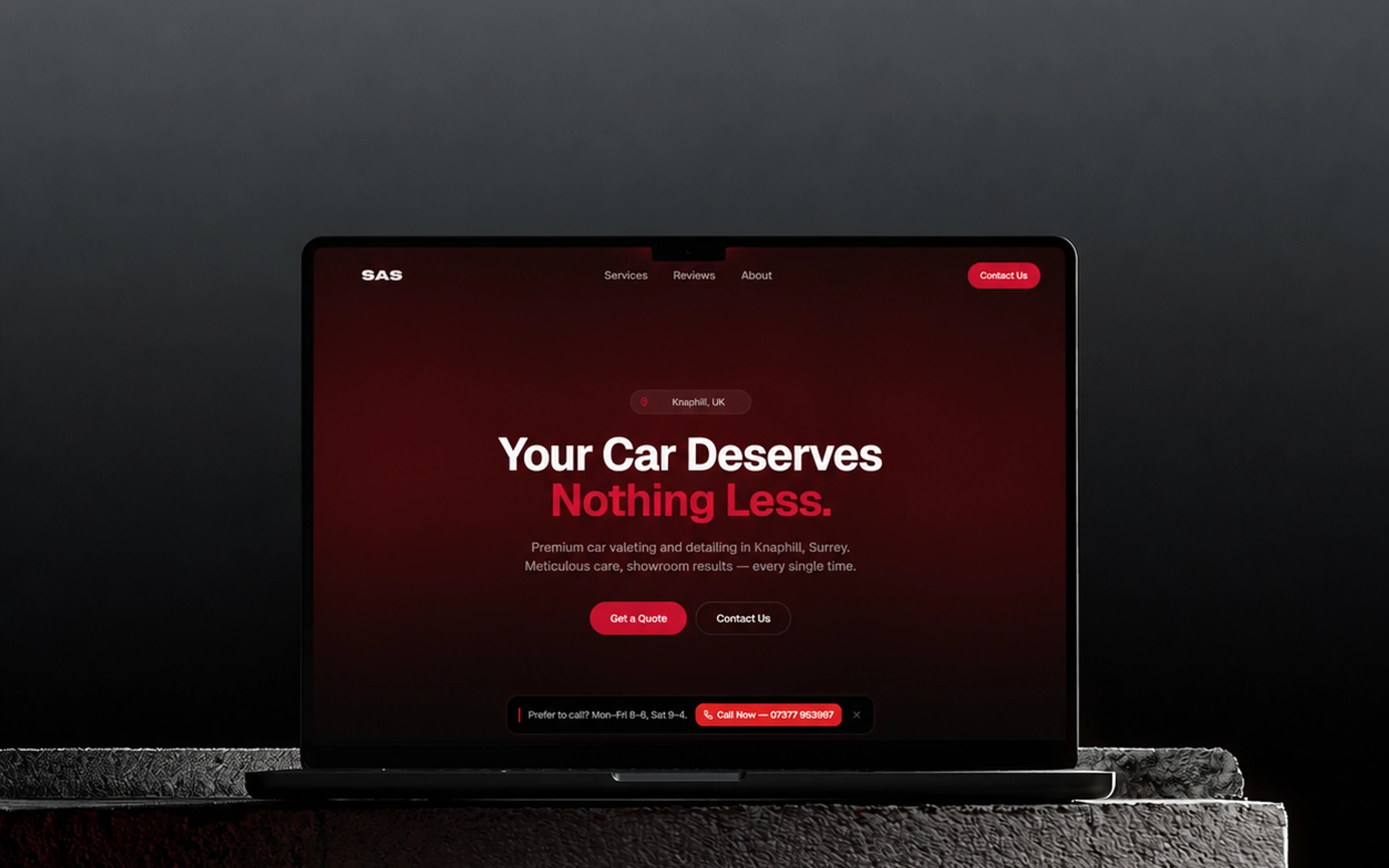 Supreme Auto Spa website shown on a laptop